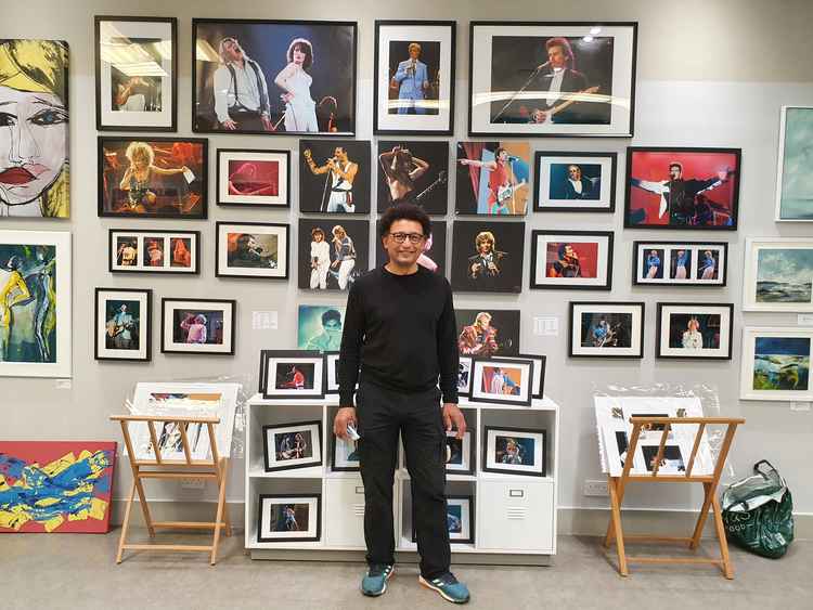 Sol in front of his work at Ealing Broadway's Pop Up Gallery