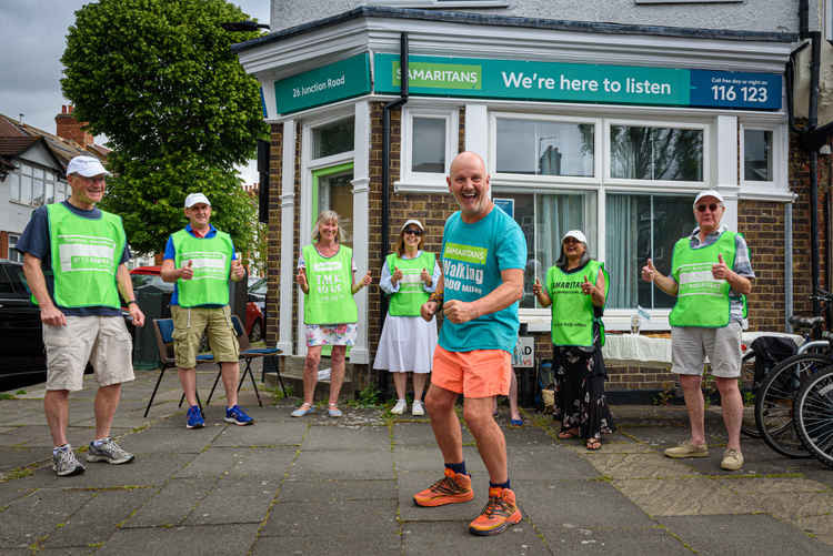 Dave Matthews (front), who's undertaking an epic 6,000-mile trek on foot to visit all of the 201 Samaritans branches reached the Ealing, Hammersmith and Hounslow branch and was congratulated by local volunteers, including local director, Heena Johnson
