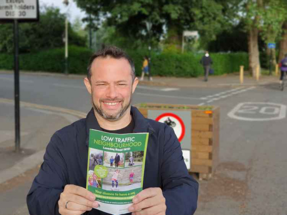 Ealing Lib Dem leader, Gary Malcolm, in front of an LTN holding the consultation leaflet. Image Credit: Gary Malcolm