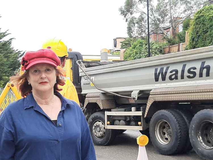 Amanda Souter outside entrance to Old Oak Common station building site on HS2 site. Image Credit: Julia Gregory