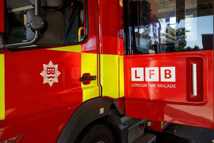 A woman and a teenager were led to safety by firefighters. Image Credit: London Fire Brigade