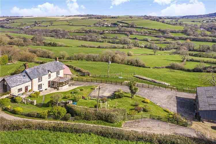 Lower Watchcombe Farm which enjoys stunning views over the Umborne Valley