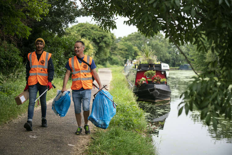 Led by group founder, David Posnett (right), a volunteer team of 65 members spent last Saturday, July 24, clearing the Paddington Arm of the canal. Image Credit: Canal & River Trust