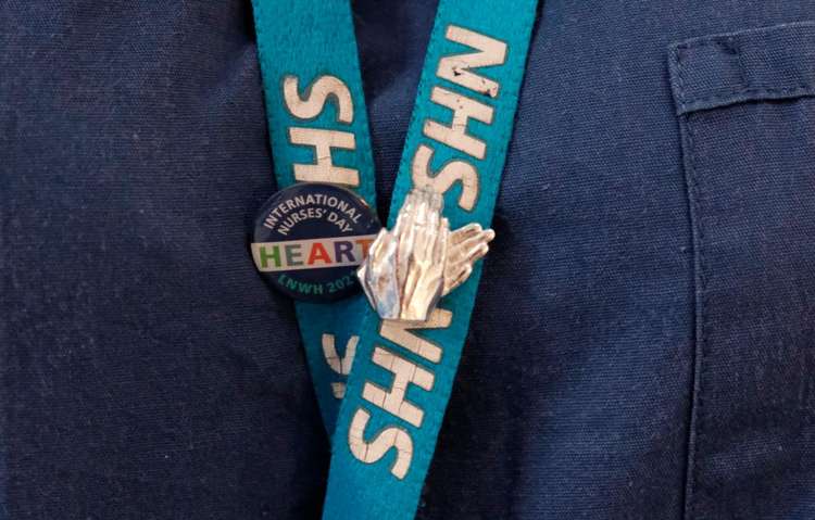 The pins are shaped as a pair of hands symbolising 'Clap for Carers'. Image Credit: London North West University Healthcare