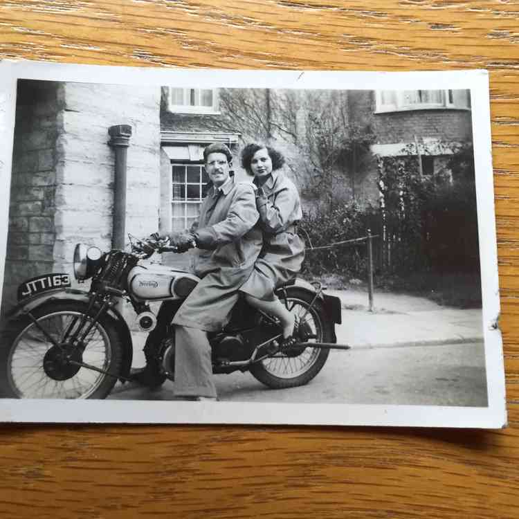 Tim and Beryl on Tim's trusted Norton outside the Drill Hall