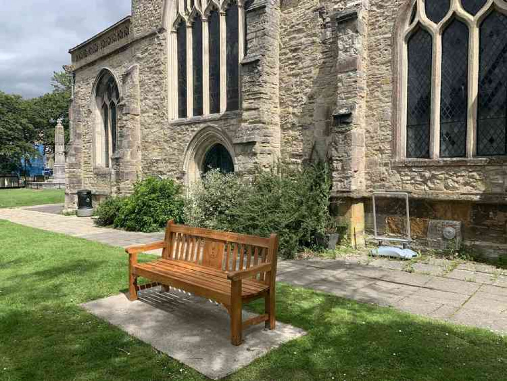 The refurbished seat donated to the Minster Green by Axminster Carnival on the occasion of the Queen's Diamond Jubilee in 2012