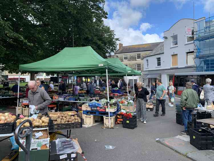 A one-way system in operation with social distancing at Axminster Market