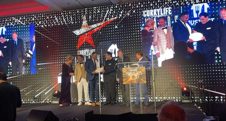 Haweli owner Manik Miah picked up the prize at the CurryLife Awards. (Image: Manik Miah)