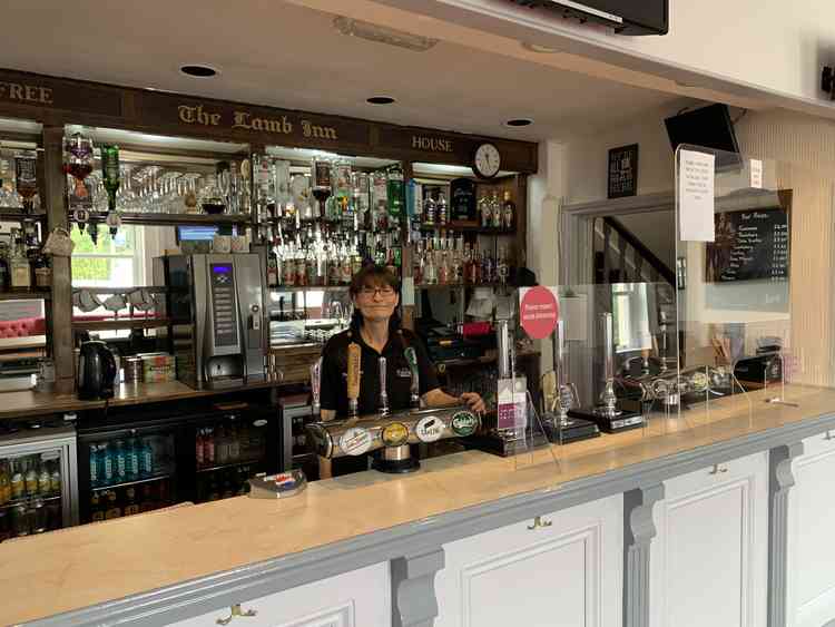 The Lamb Inn's landlady Bel Polanek behind her social-distanced bar