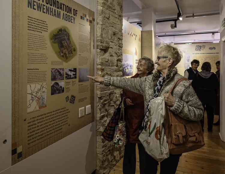 Local residents enjoying learning about the history of Newenham Abbey