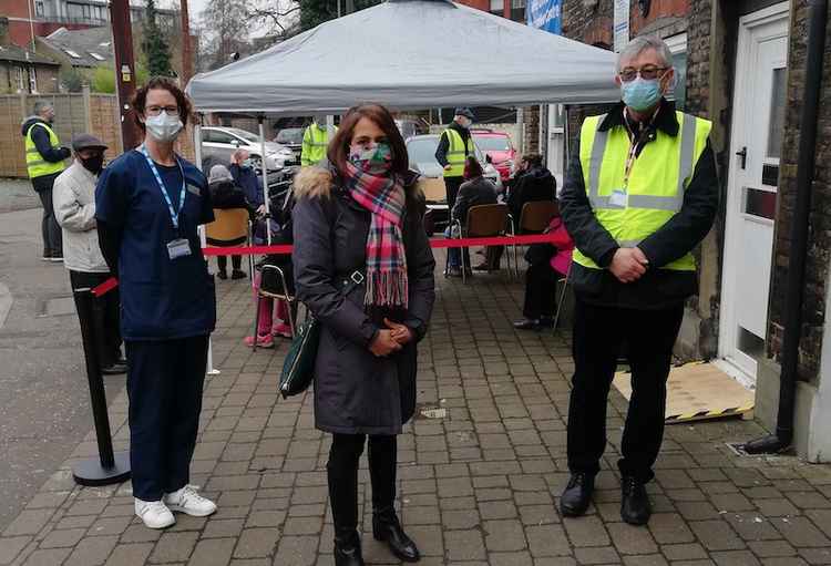 MP Munira, centre, with Dr Harrington on the left