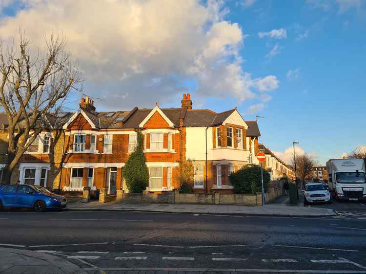 Late afternoon sun hits these houses in Twickenham