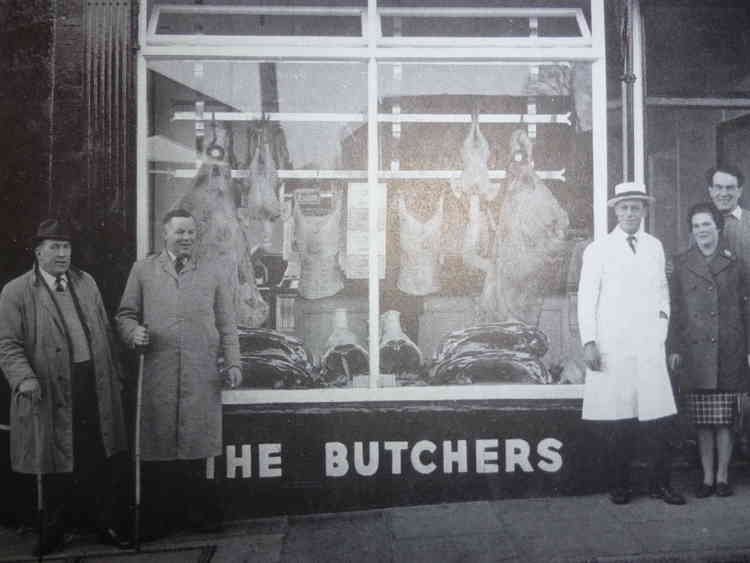 Regulars of the Axminster Inn – outside Stuart's Butchers -   Frank Rowe, Martin Bright, Lionel and Beryl Stuart, and  Cecil Chaffey