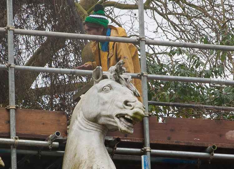 The statues were encased in scaffolding while the works took place