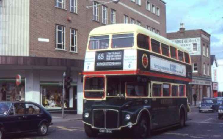 The 65 leaving Norbiton Garage travelling to the Hawkes factory in Ham. Image Credit: London Bus Museum