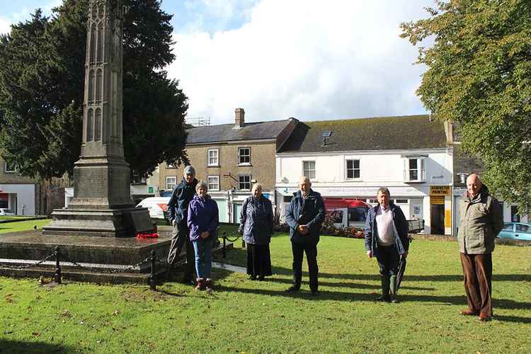 Members of the Axminster branch of the Royal British Legion gather at the war memorial for a site meeting to plan the Remembrance events