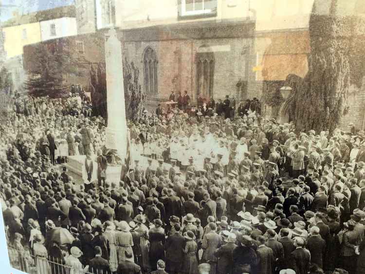 Axminster's war memorial was first dedicated in 1921, with this photo currently displayed in the window of the former McCol's newsagents, and will be refurbished next year for the 100th anniversary