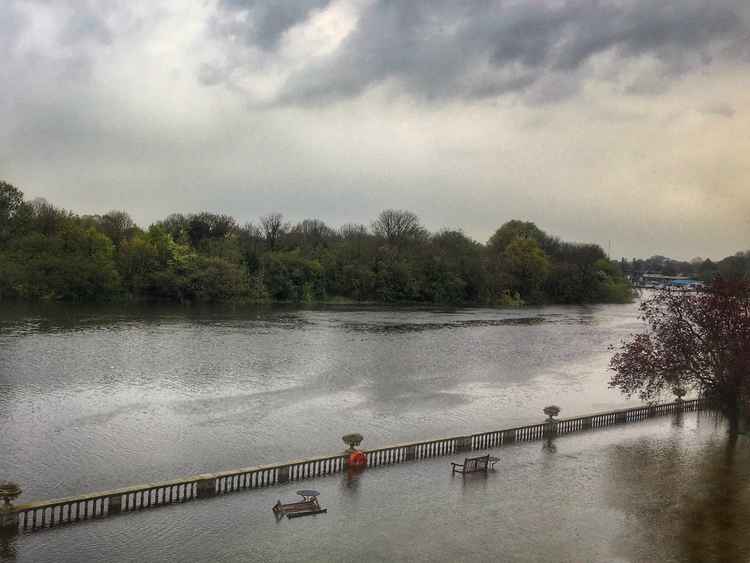 A bench was knocked over yesterday with the force of the rising tide (Image: Ruth Wadey)