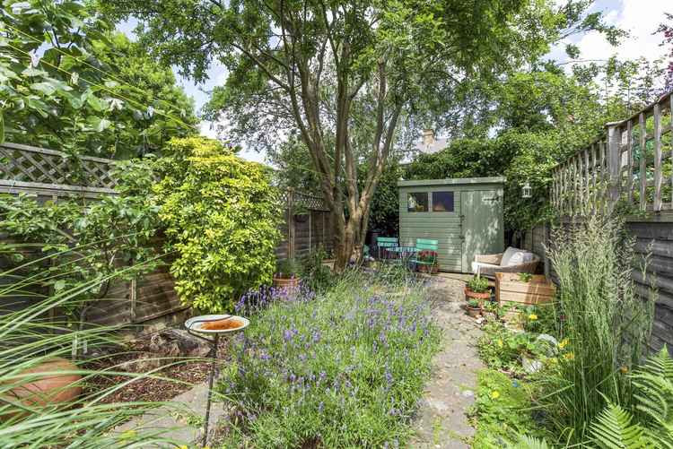 The rear garden is an idyllic and secluded haven to unwind and enjoy al-fresco dining