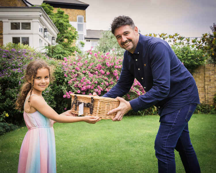 Gia being handed her prize by Darren Bartlett (Image: DK Clarke Photography)