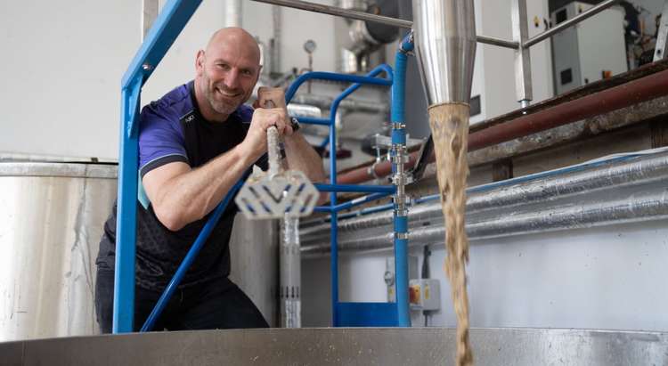 England rugby legend Lawrence Dallaglio getting his hands dirty at the brewery (Image: Jawbone Brewery)