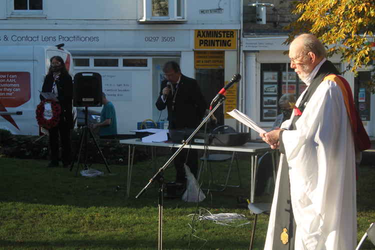 The Reverend Geoffrey Walsh, chaplain to the Axminster branch of the Royal British Legion, delivers the Exhortation