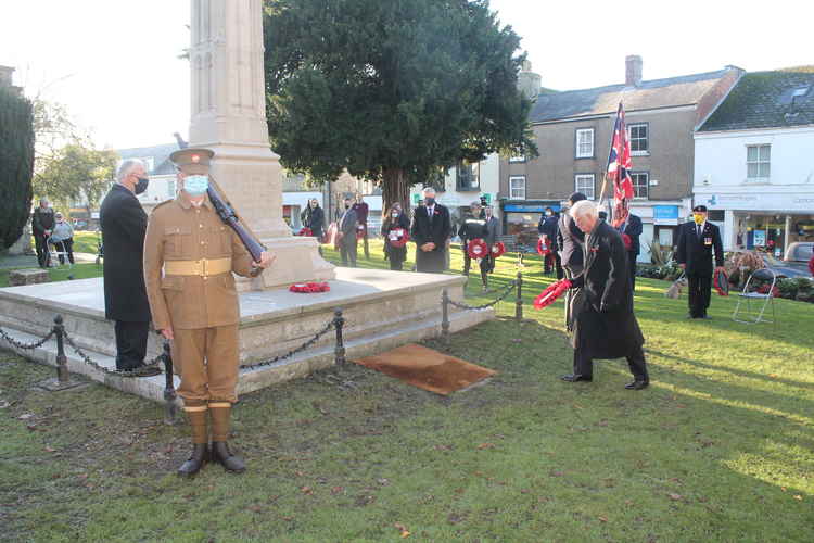 Chris Kimber, chairman of East Devon Conservatives, lays a wreath on behalf of MP Neil Parish