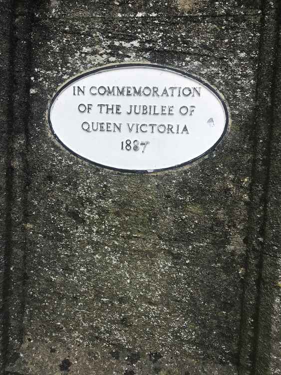The plaque on the Trinity Square fountain commemorating Queen Victoria's Golden Jubilee in 1887