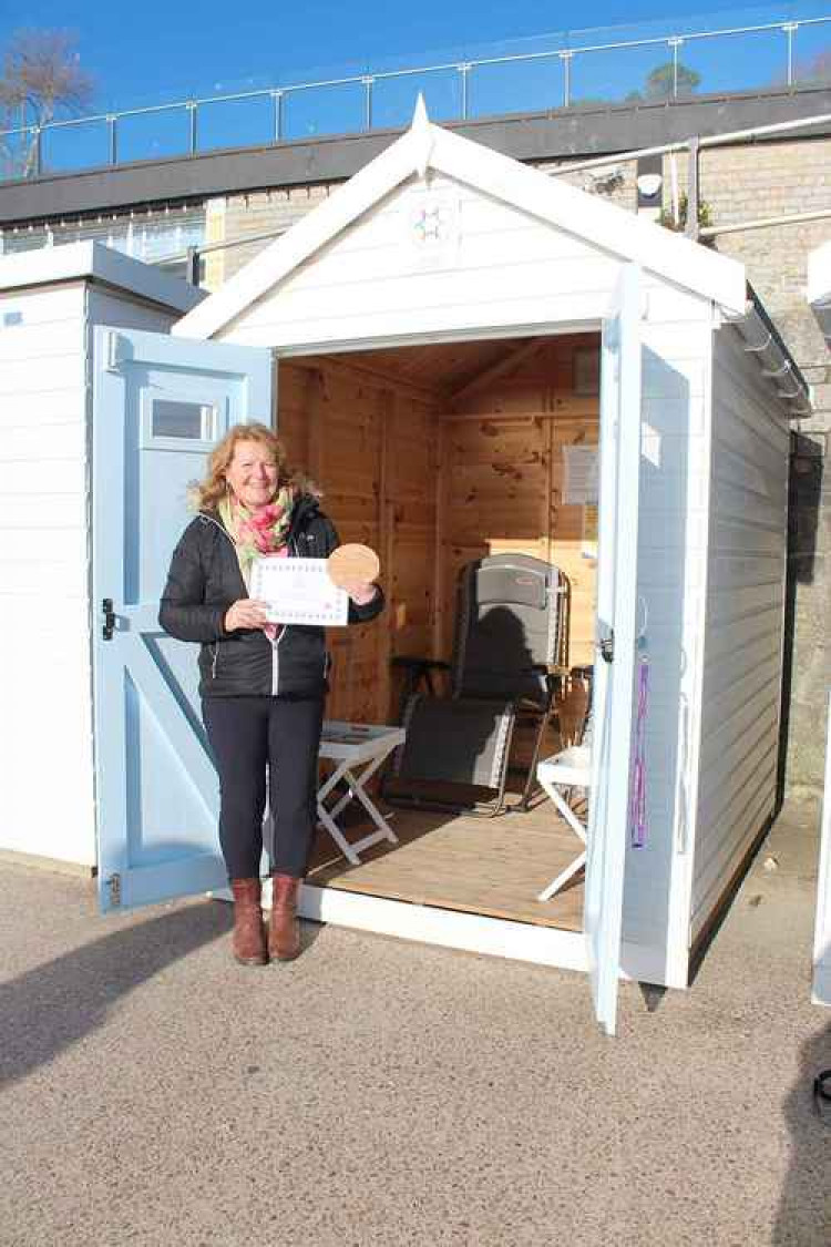 Mary Kahn of Axminster and Lyme Cancer Support pictured at the Mary Anning Beach Hut on Marine Parade