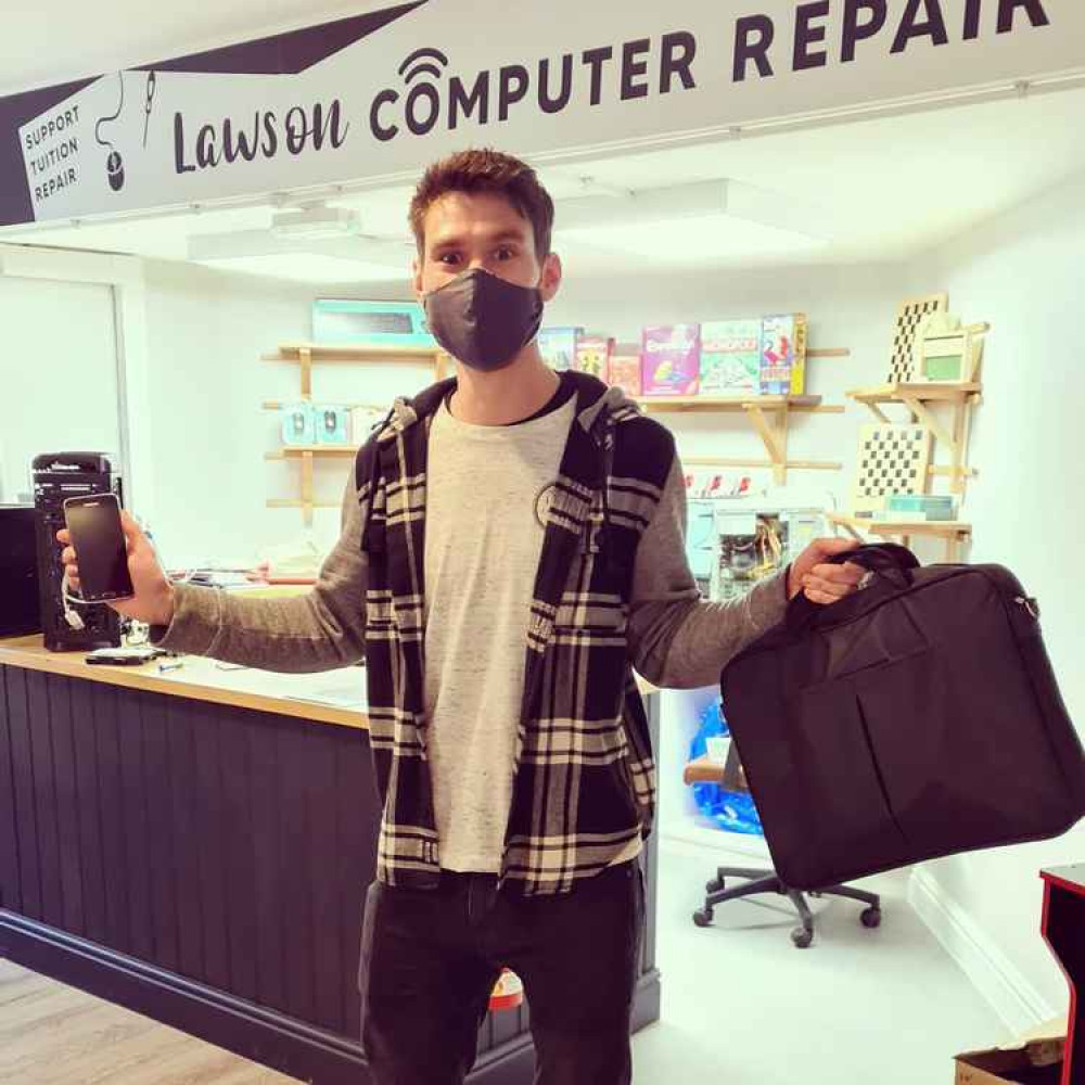 Luke Lawson of Lawson Computer Repair, based at the Community Waffle House in Axminster, with some of the donated devices