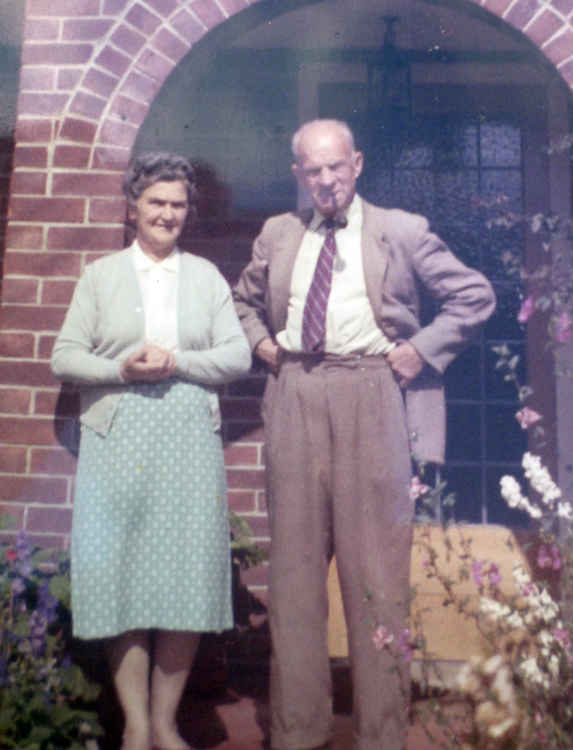 George and Hilda Moulding outside their bungalow in Wide Post Lane