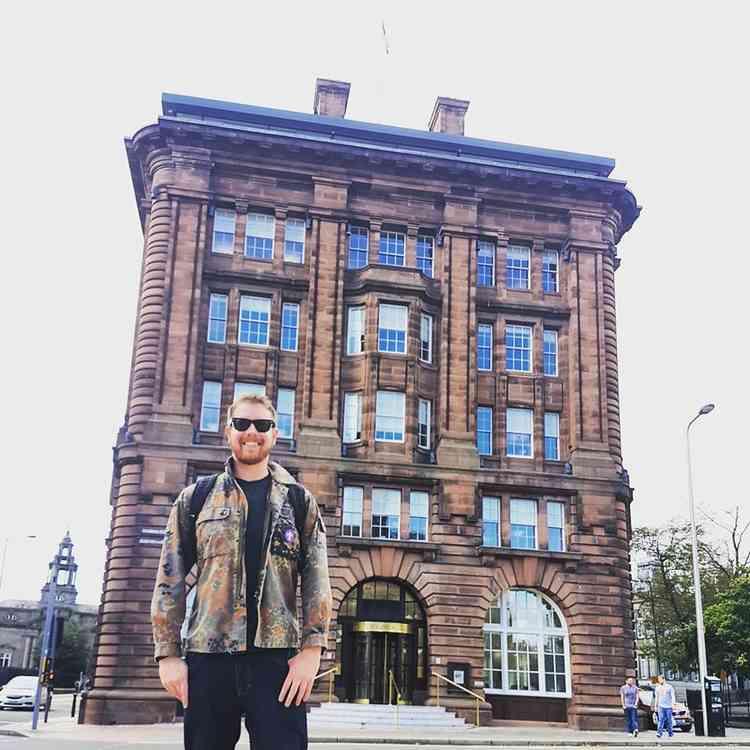 Danny Pearson outside the legendary DC Thompson building in Dundee, publishers of The Beano since 1938