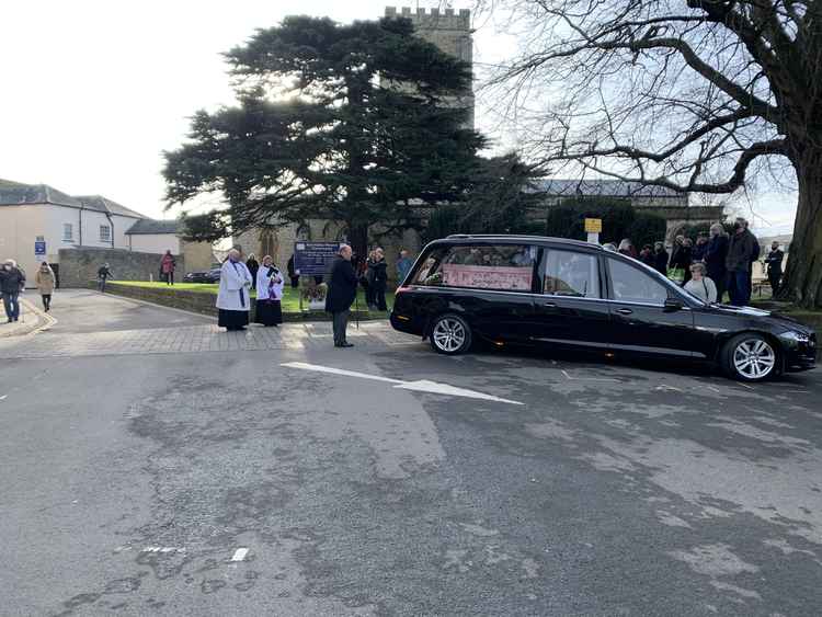 Mourners gathered outside the church to say their final goodbyes to Anni