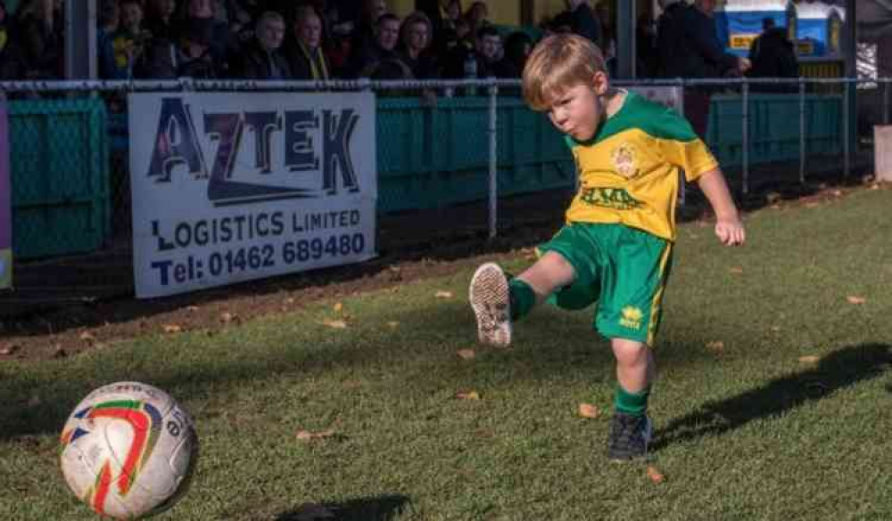 Get behind Hitchin Town's 'Captain Tom' as young Teddy aims to walk 25 laps of Top Field to boost crowdfunder. CREDIT: PETER ELSE