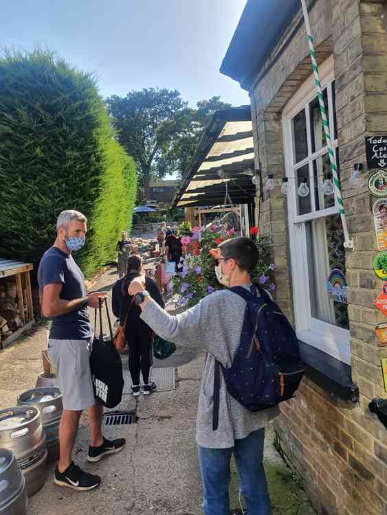 Long queues are a feature of Hitchin Food Rescue as people back the initiative. CREDIT: Hitchin Nub News