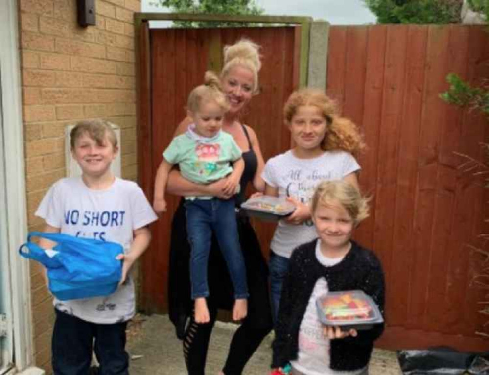 Hitchin food provision heroes - helping hard-pressed families avoid hunger during lockdown and beyond. PICTURE: A happy family who have benefitted from Hitchin food provision. CREDIT: Hitchin Food Provision Team