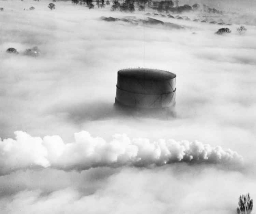 Hitchin morning briefing Wednesday September 30. PICTURE: An aerial shot of Hitchin gasworks through the fog with a plume of smoke from a passing locomotive in 1949. CREDIT: BRITAIN FROM THE AIR