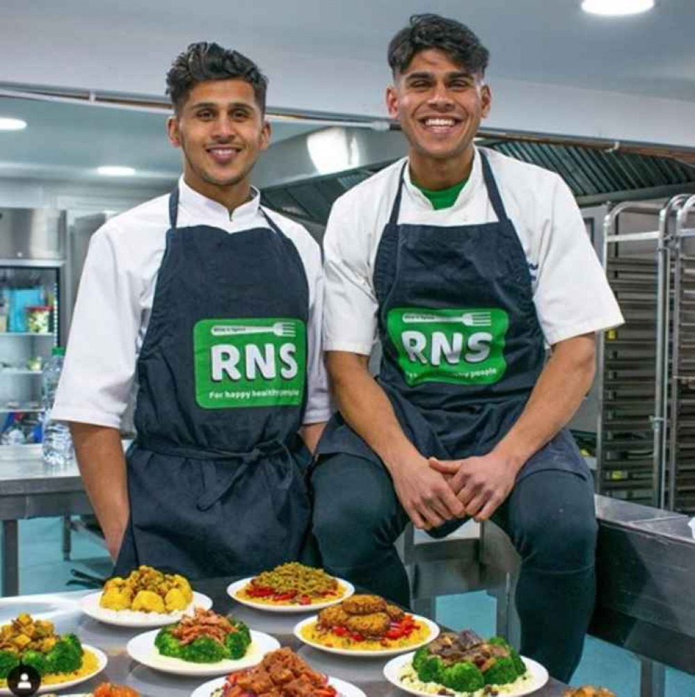 Hitchin Town's Jhai Dhillon cooks up a recipe for success ahead of Canaries FA Cup clash at St Albans. PICTURE: Jhai and Simmy Dillon, owners of Hitchin's highly-acclaimed health food business Rice and Spice