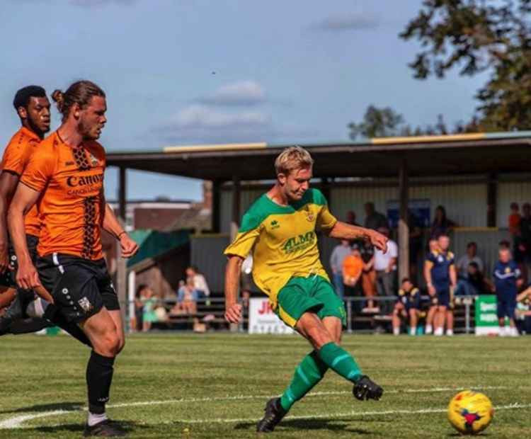 Hitchin Town striker Callum Stead compared to Jamie Hardy by boss Mark Burke as Canaries gear up for FA Cup clash at St Albans. PICTURE: Callum Stead scores for Hitchin against National League Barnet in pre-season. CREDIT: PETER ELSE