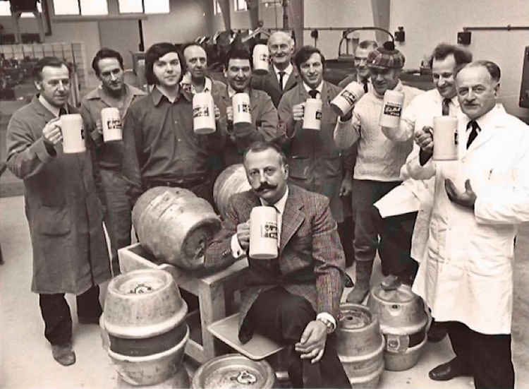 Employees celebrate Oktoberfest in 1979. With them is the popular Managing Director Robert H. Raeithel (with moustache).