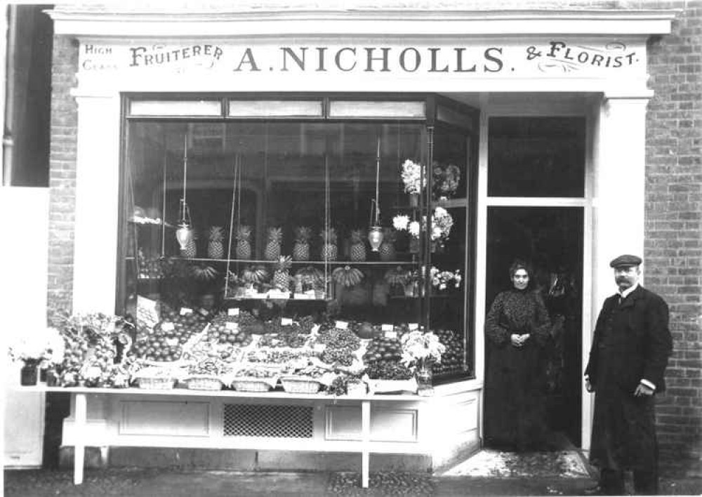 Hitchin daily briefing Thursday December 17. PICTURE: Frozen In Time: A Nicholls, fruitier and floristry shop, Hitchin, 1900. CREDIT: Frozen In Time exhibition at North Herts Museum in Hitchin.