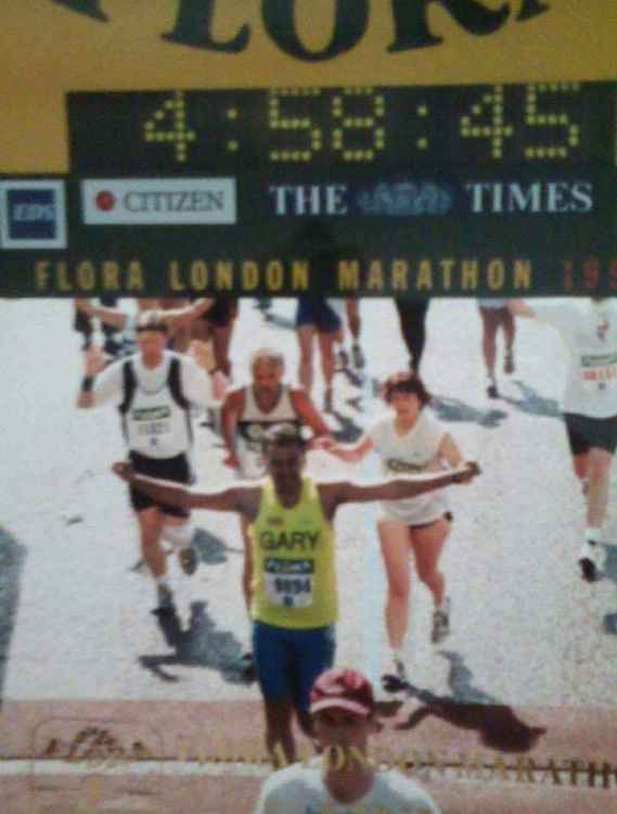 Owen's hero, dad Gary, crossing the finishing line at the London Marathon in 1998.