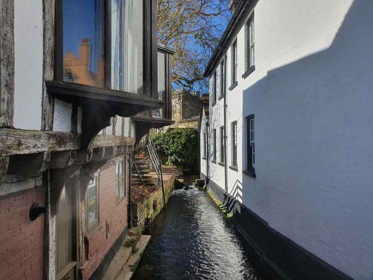 The River Hiz that flows near to Lyndhurst's office in Bridge Street. Hitchin MP Bim Afolami has hailed the group for the excellent work they do for our community. CREDIT: @HitchinNubNews