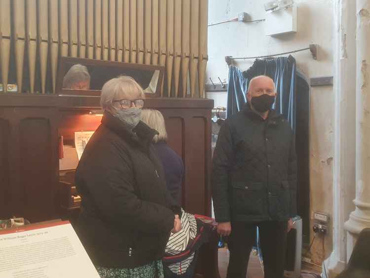 Associate vicar Amanda Ferris with church warden Royston Jones in front of the iconic musical instrument. CREDIT: @HitchinNubNews