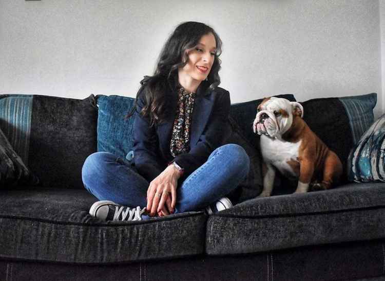 Hitchin Nub News column: New North Herts District Council leader Elizabeth Dennis-Harburg reflects on a busy month. PICTURE: Elizabeth and her dog Maggie