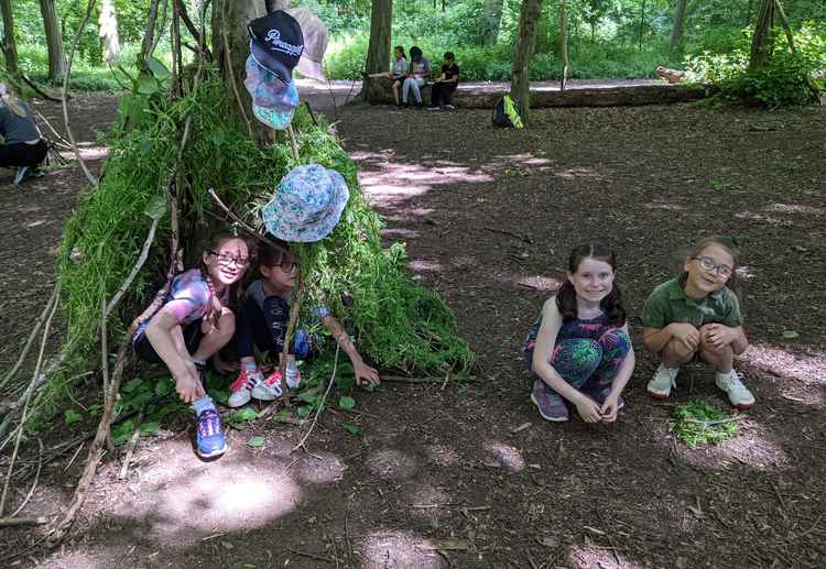 A chance for the children to use their den creations together after working as a team to create them.