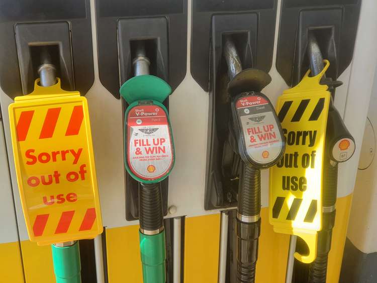 Sorry out of use signs on forecourt pumps in Hitchin. CREDIT: @HitchinNubNews