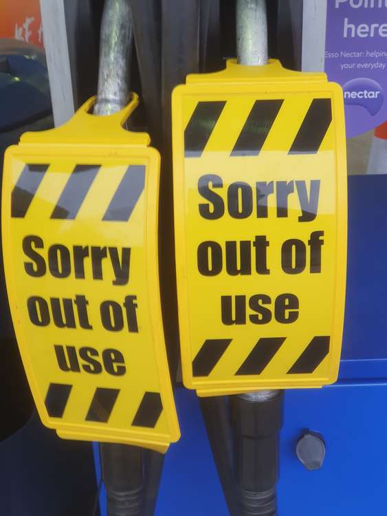 Hitchin: Sold out signs in many petrol stations after panic buying despite pleas for calm. PICTURE: The Esso garage on Nightingale Road was out of fuel on Saturday. CREDIT: @HitchinNubNews