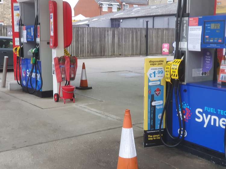 An empty forecourt at the Esso garage after all its weekly fuel supplies sold out. CREDIT: @HitchinNubNews
