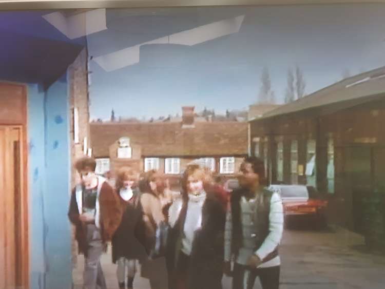 Fun Boy Three head to the stage door at the Regal Theatre walking where the Regal Chambers car park is now. In the background you can see Bancroft. CREDIT: BBC4